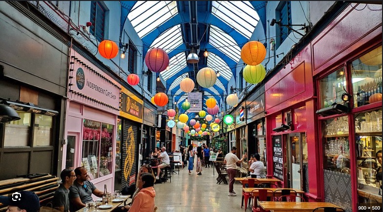Inside Brixton Village — the covered Granville Arcade, lined with independent traders